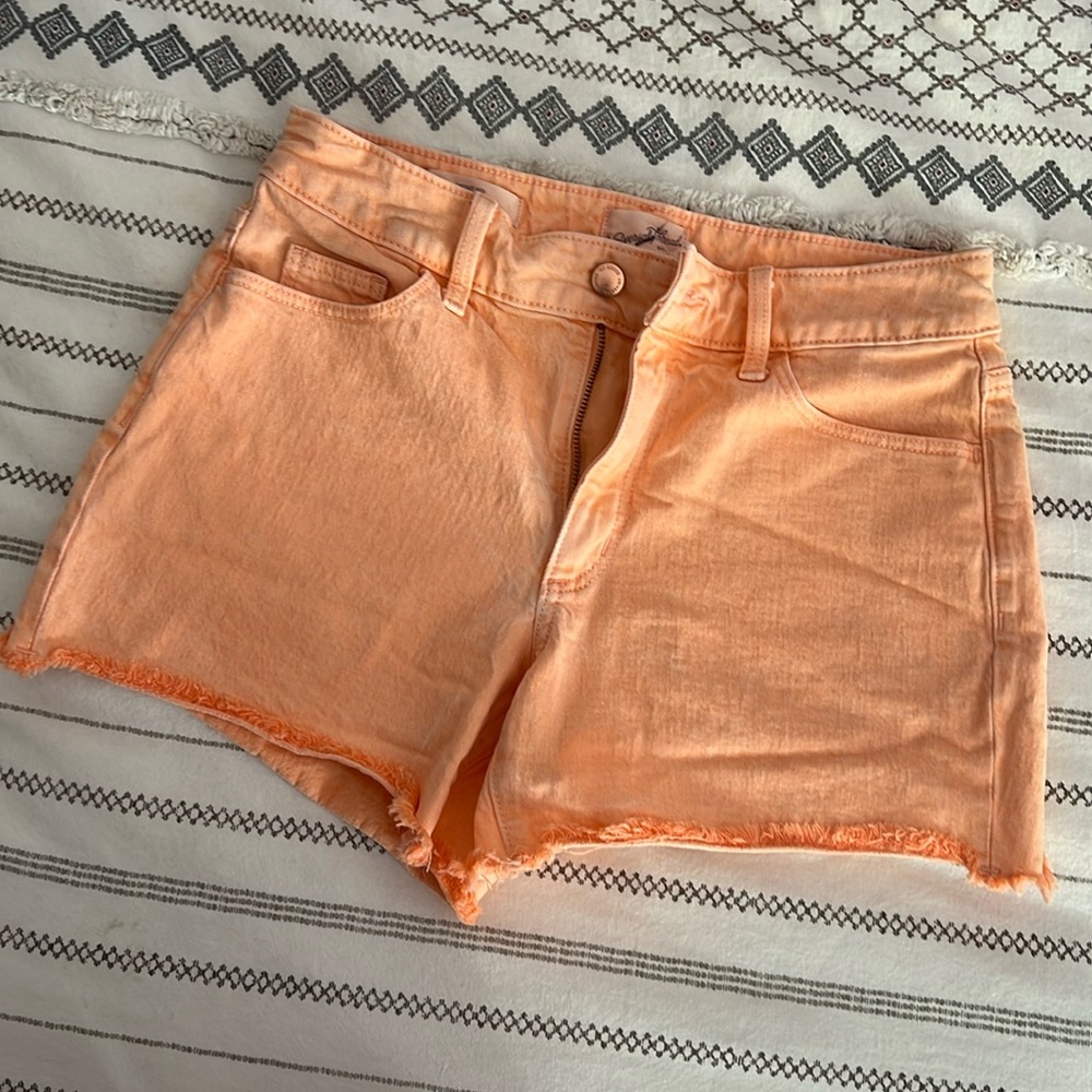 Orange mid rise shorts
